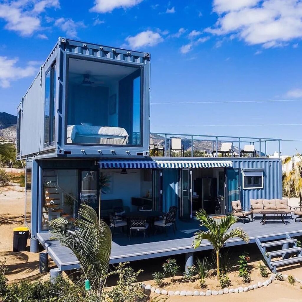 a beautiful blue-colored two-floor container house.