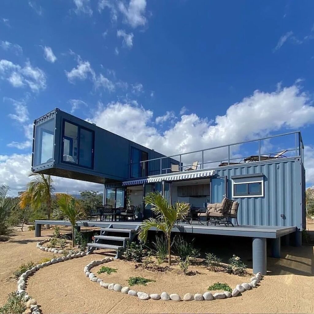 blue color setup of portable container home with two floors.